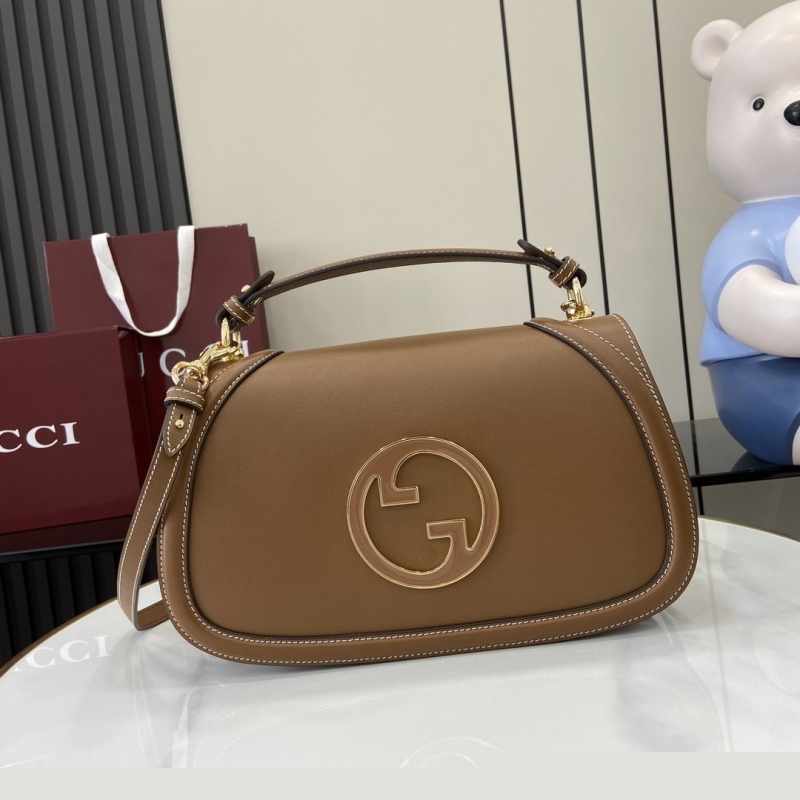 G*u*i top handle bags